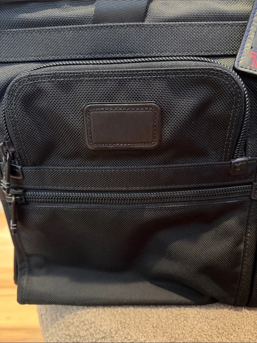 Tumi Black Nylon Briefcase with Dual Front Pockets and Leather Tag